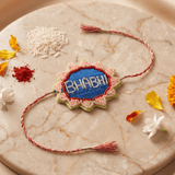 Blue Embroidered Rakhi with Delicate Pink and Green Beadwork - Western Era Rakhi for women