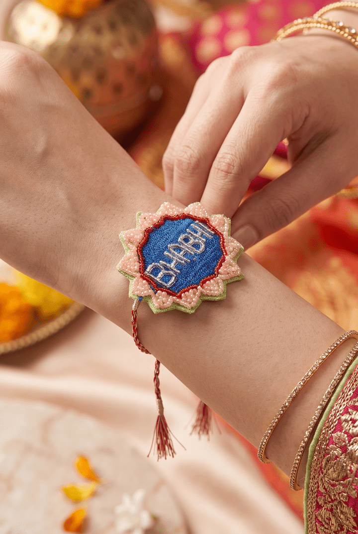 Blue Embroidered Rakhi with Delicate Pink and Green Beadwork - Western Era Rakhi for women