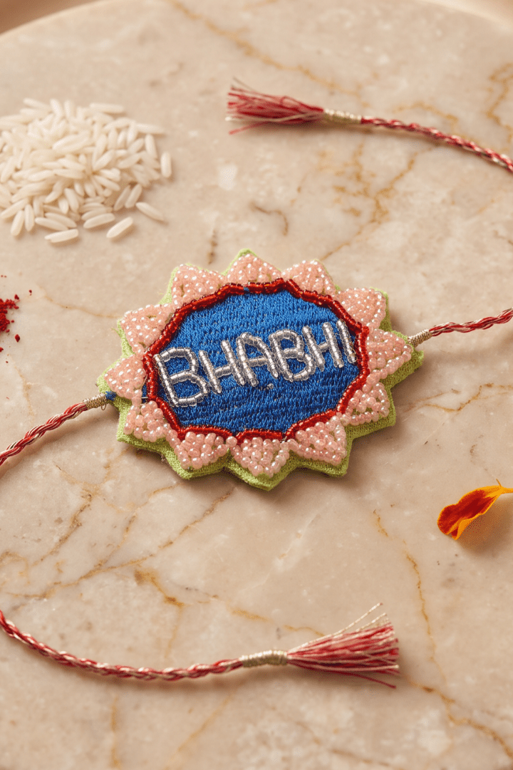 Blue Embroidered Rakhi with Delicate Pink and Green Beadwork - Western Era Rakhi for women