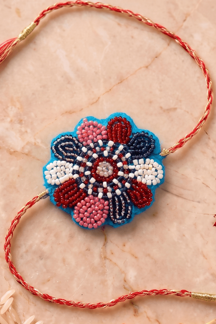 Elegant Floral Beadwork Thread Handcrafted Rakhi - Western Era Rakhi for women