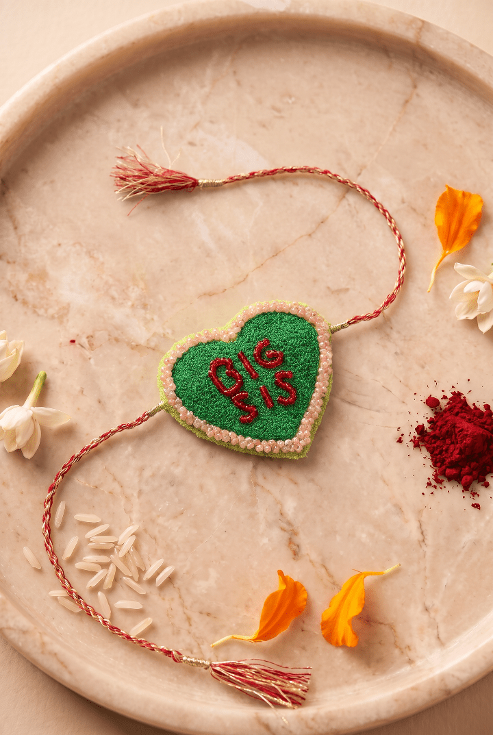 Green Heart Shaped Rakhi with Pink Beadwork - Western Era Rakhi for women
