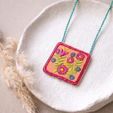 Fabric Necklace Featuring Intricate Floral Thread Embroidery In Playful Hues
