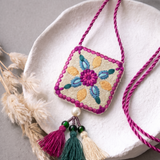 Necklace Featuring Intricate Floral Thread Embroidery In Rich Pink, Teal & Gold Tones With Tassels
