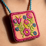 Fabric Necklace Featuring Intricate Floral Thread Embroidery In Playful Hues