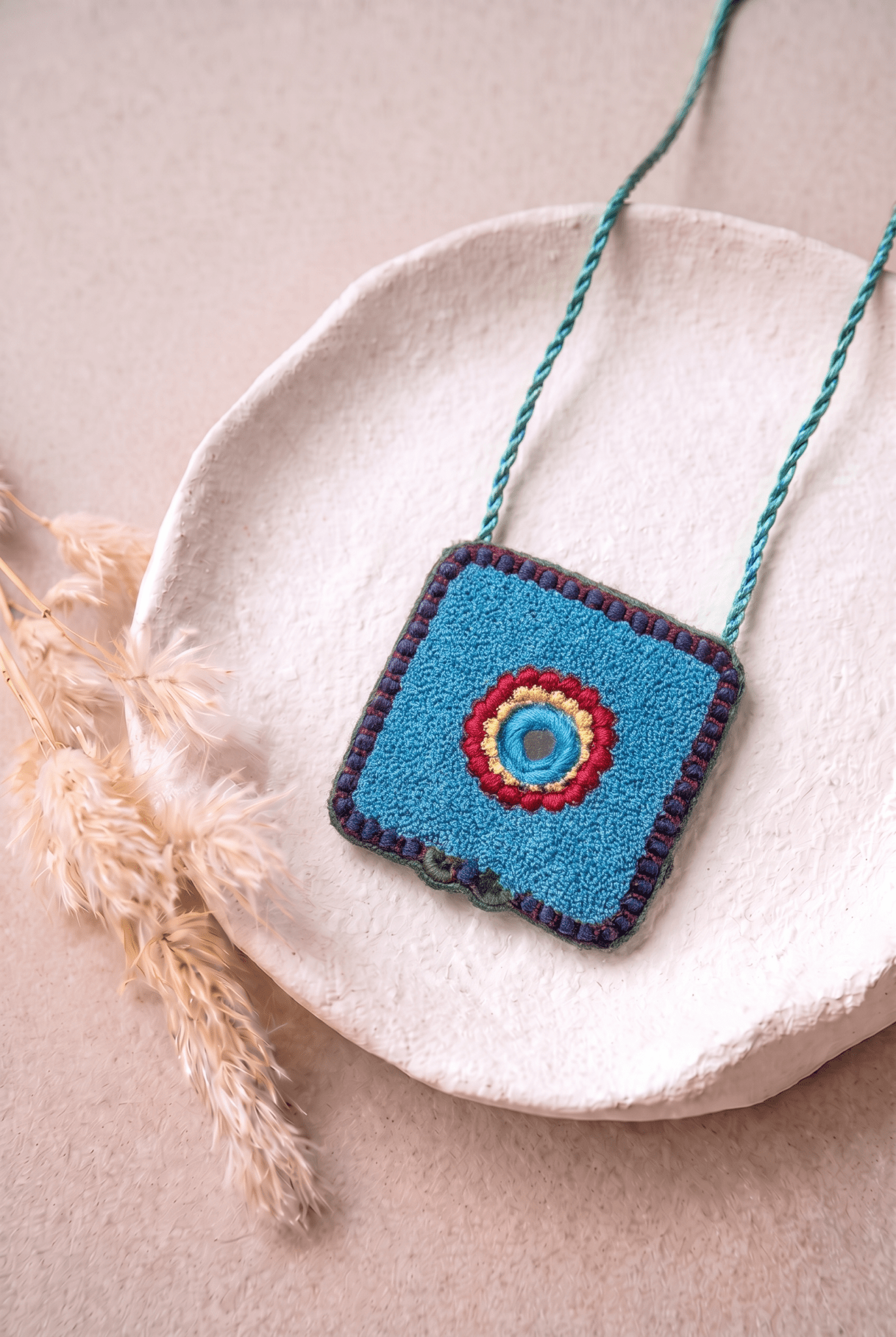 Necklace Featuring A Textured Turquoise Pendant Detailed With Vibrant Thread Embroidery - Western Era Accessories for women