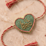 Olive Green Heart Shape Rakhi with Pink Bead Work - Western Era Rakhi for women
