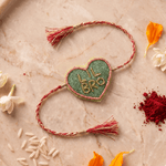 Olive Green Heart Shape Rakhi with Pink Bead Work - Western Era Rakhi for women