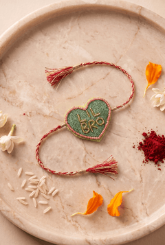 Olive Green Heart Shape Rakhi with Pink Bead Work - Western Era Rakhi for women
