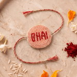 Peach / Red Pleated Rakhi with Bhai Motif - Western Era Rakhi for women