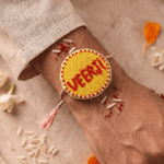 Red Bead Detailing Rakhi with Soft Pink Braided Threads - Western Era Rakhi for women