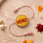 Red Bead Detailing Rakhi with Soft Pink Braided Threads - Western Era Rakhi for women