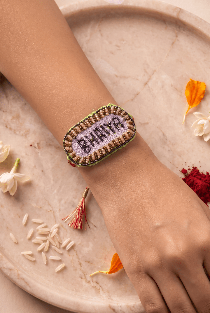 Soft Lavender Embroidered Rakhi with Gold and Pink Embroidered Rakhi - Western Era Rakhi for women