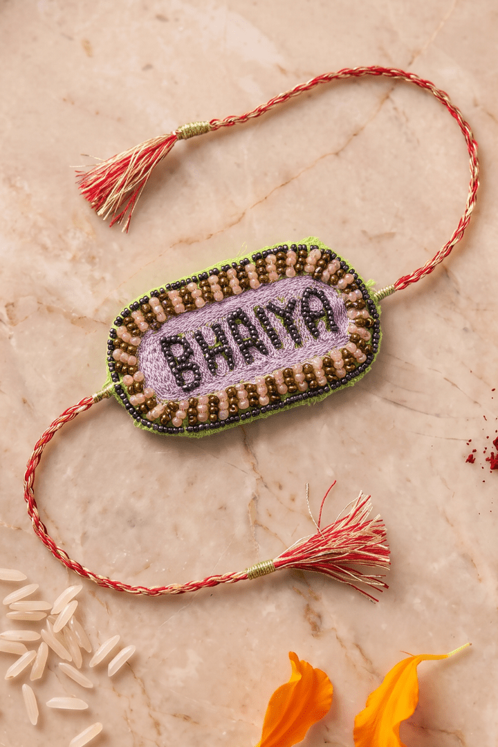 Soft Lavender Embroidered Rakhi with Gold and Pink Embroidered Rakhi - Western Era Rakhi for women
